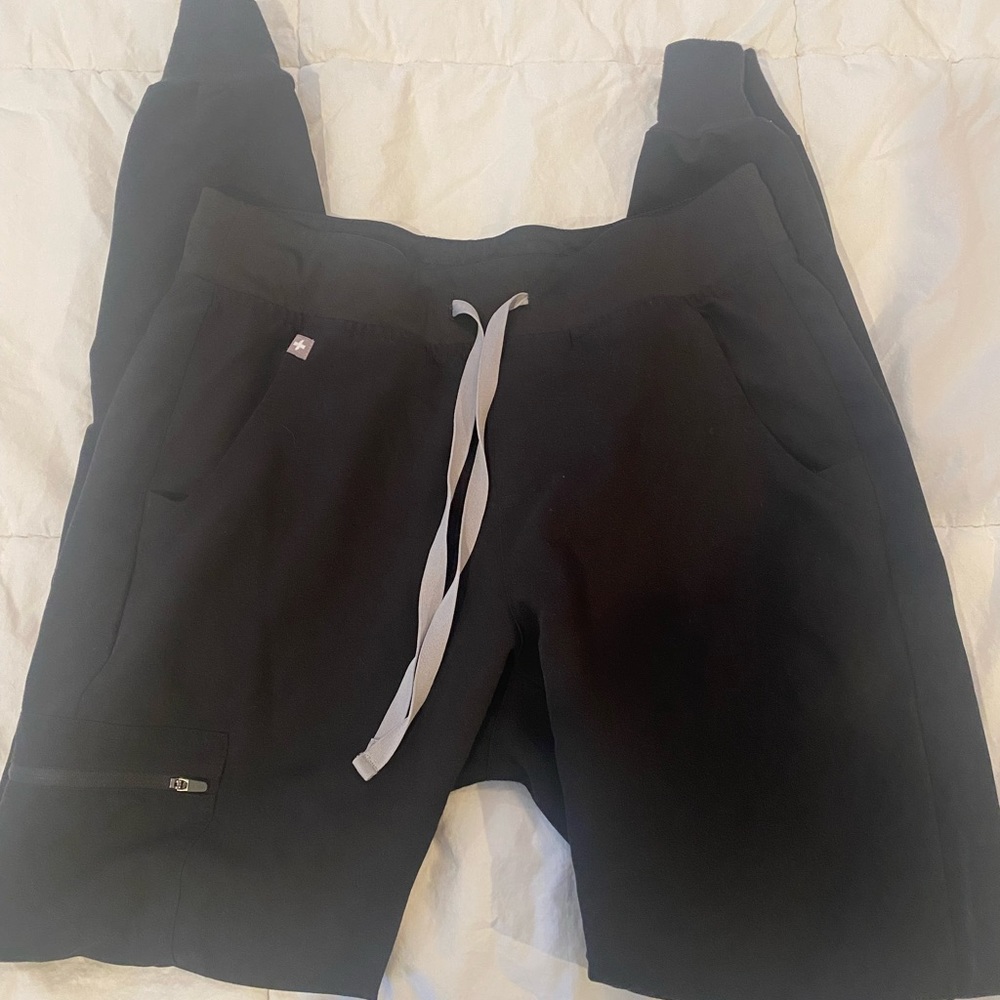 Women’s technical collection size small tall. They are too long for me